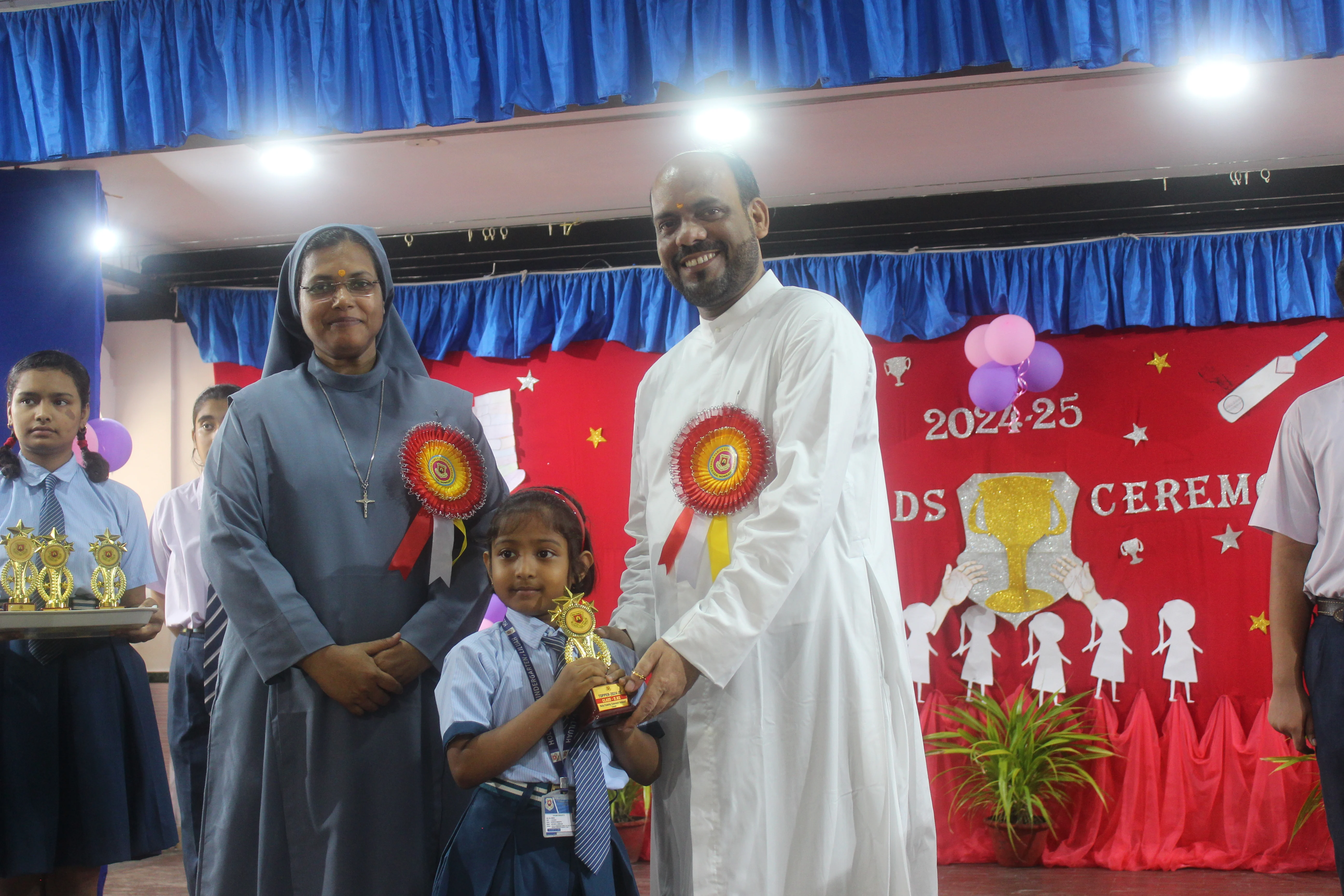 Award ceremony for meritorious students at Holy Family Convent School Liluah